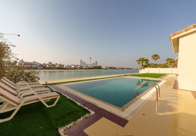 Holiday villa with pool and private beach with Royal Atlantis views in Palm Jumeirah Dubai