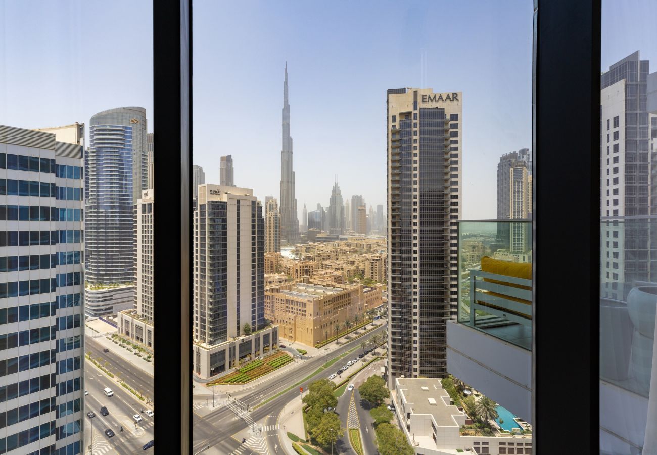 Apartment in Dubai - Sky-High Panoramic Apt w/ Iconic Burj Khalifa Vws  