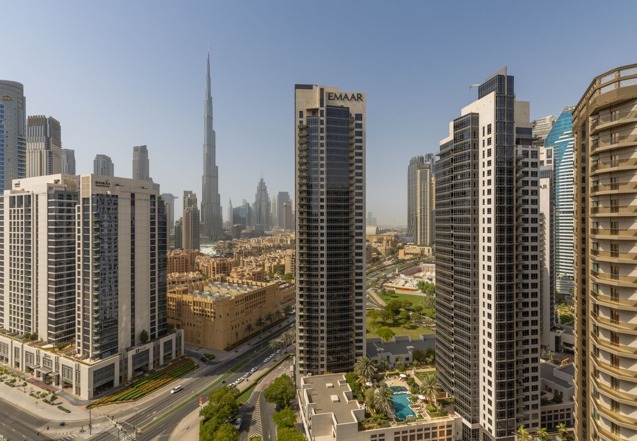 Apartment in Dubai - Sky-High Panoramic Apt w/ Iconic Burj Khalifa Vws  